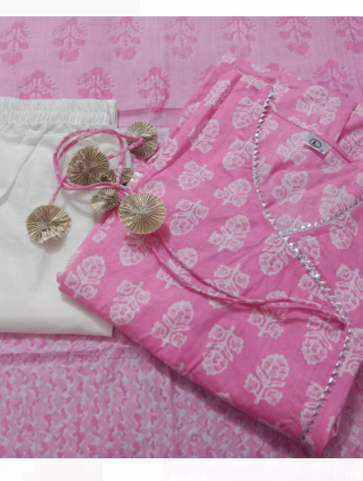 A pink anarkali floral cotton salwar suit with a dupatta is a beautiful and traditional Indian outfit. Anarkali refers to the style of the dress, which features a long, flowing silhouette with a fitted bodice and flared skirt