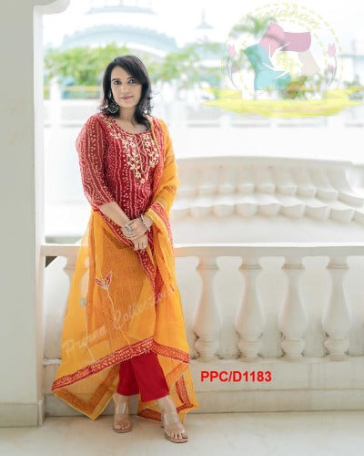 Orange Bandhani Print Cotton Suit With Organza Dupatta