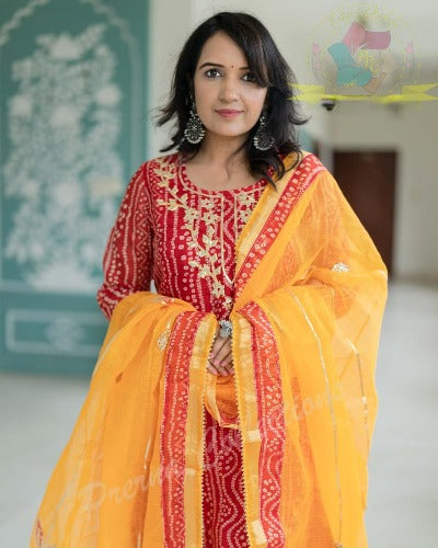 Orange Bandhani Print Cotton Suit With Organza Dupatta